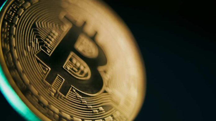 Close,Up,Of,Gold,Bitcoin,Coin,Spinning,On,The,Dark