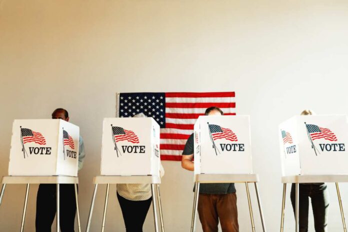 Us,Election,Day,,Diverse,People,At,Voting,Booth,At,Us