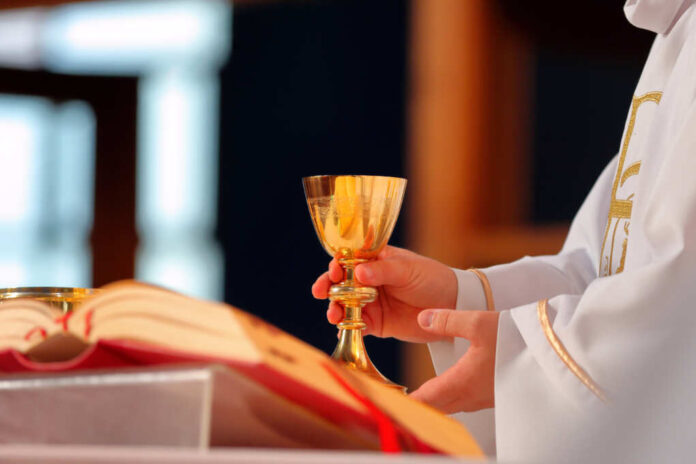 Priest,Celebrate,Mass,At,The,Church,And,Empty,Place,For