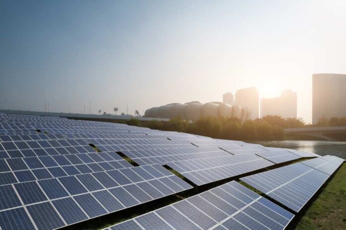 Sustainable,Energy,Solutions:,Solar,Panels,In,Urban,Landscape,At,Sunrise