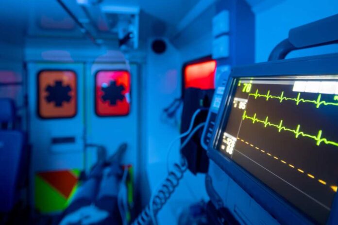 Selective,Focus,On,Monitor,Of,Vital,Signs,Against,Patient,On