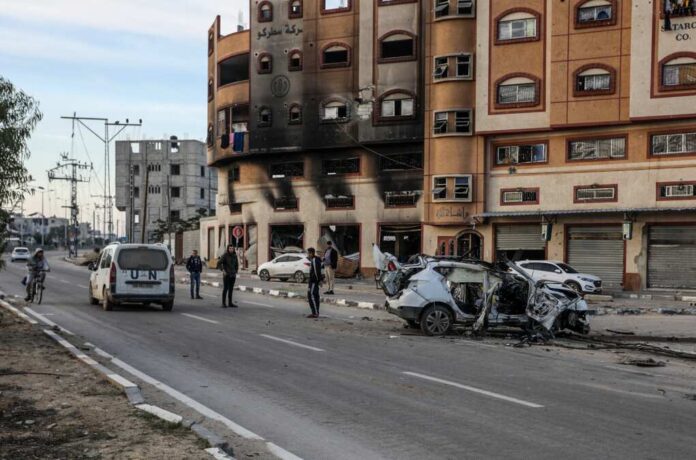 Palestinians,Inspect,A,Car,Belonging,To,The,Charity,Aid,Security
