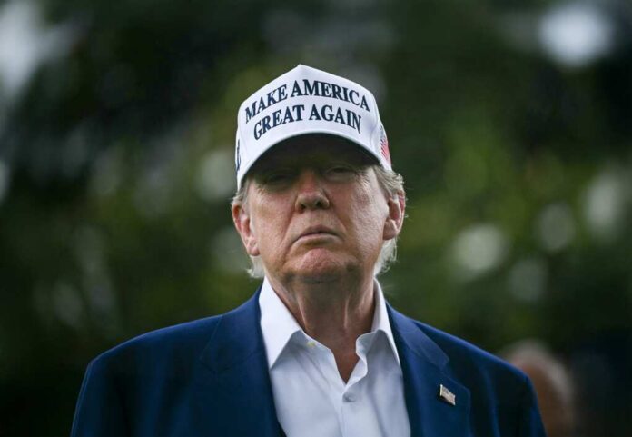 Us,President,Donald,Trump,Speaks,To,The,Press,As,Workers