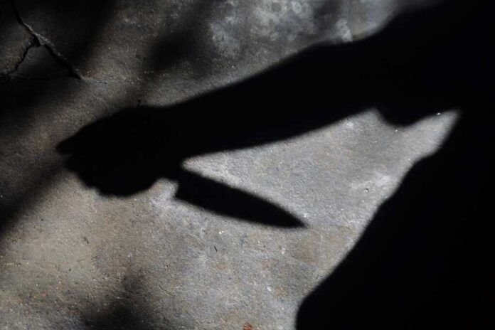 Silhouette,Of,Sad,Male,Holding,Knife.,Concept,Of,Killing