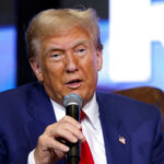 Freedom Portal Plan: Trump vs. EU Censorship A man in a blue suit speaking into a microphone