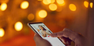 Person using a smartphone to interact with a dating app