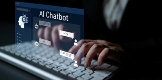 Person typing on a keyboard with a digital AI chatbot interface displayed