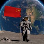 An astronaut on the moon holding a Chinese flag with Earth in the background