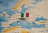 Map of Europe with a small Italian flag pin