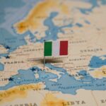 Map of Europe with a small Italian flag pin