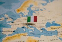 Map of Europe with a small Italian flag pin