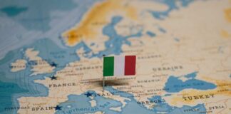 Map of Europe with a small Italian flag pin