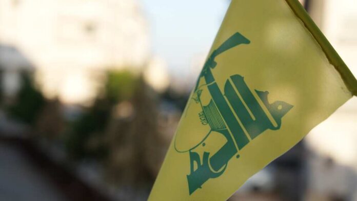 Close-up of a yellow flag with a green design