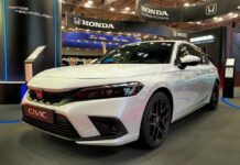 White Honda Civic displayed at a car exhibition