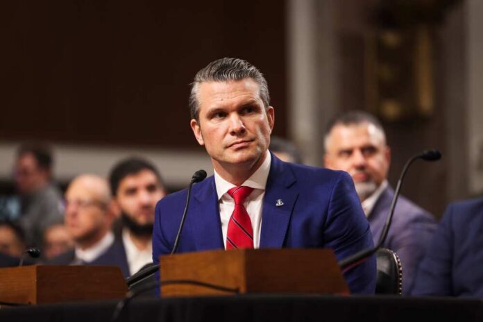 Individual in formal attire seated at a senate hearing