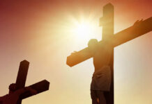 Brutal Roman Execution: The Shocking Details Silhouettes of two crosses against a sunset sky