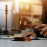 Leniency Sparks Shooting—Judge’s Words Haunt A gavel being struck on a desk in a courtroom setting