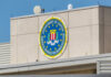 FBI emblem displayed on the exterior of a government building