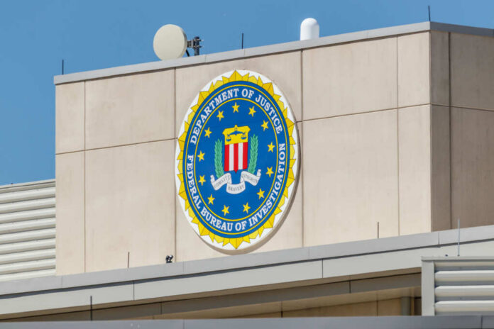 FBI emblem displayed on the exterior of a government building