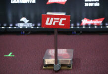 Trump’s Birthday Bash: UFC Octagon at White House UFC weighing scale with a red sign in front