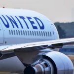 Cockpit-Breach Drama Spurs Urgent Questions Close-up view of a United Airlines airplane wing and engine