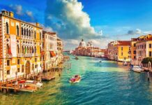 Scenic view of a canal in Venice with historic buildings and boats