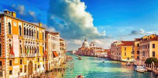 Scenic view of a canal in Venice with historic buildings and boats