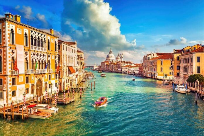Scenic view of a canal in Venice with historic buildings and boats