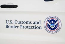 Cocaine Run SHREDDED Off Puerto Rico Side view of a U.S. Customs and Border Protection vehicle with official markings