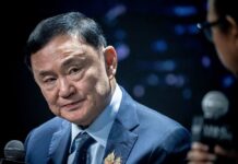 OUTRAGE in Thailand: Former PM Released Early A political figure speaking during an interview at an event