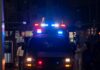 CHILLING: Rural Call Escalates to Fatal Exposure Emergency vehicle with flashing lights in a busy urban area at night
