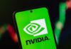 Taiwan’s Massive Nvidia Smuggling Plot Revealed NVIDIA logo displayed on a smartphone screen with a green background