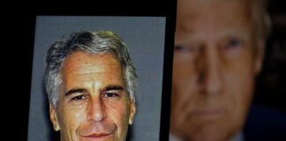 Mugshot of a man with gray hair and a serious expression