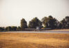 Skydiving Tragedy Sparks Chilling Mystery A small airplane on a runway surrounded by trees