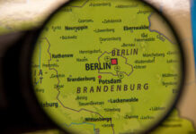Berlin Stalled—Poland Orders 1,000 Tanks Close-up view of a map showing Berlin and Brandenburg under a magnifying glass