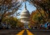 War Powers Showdown Shocks Capitol U.S. Capitol dome framed by a tree-lined street