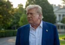 Judicial Bombshell Hits Trump’s Parks Overhaul A political figure with a serious expression standing outdoors near the White House