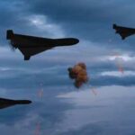 Deep-Strike Drones Rattle Kremlin Three military drones fly through a cloudy sky amid anti-air fire