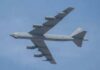 Dark Spy Plane Taunts NATO Skies Military bomber aircraft flying against a blue sky
