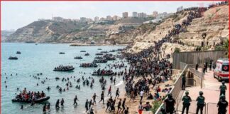 Crowd breaks through border from Spanish territory of Ceuta from Morocco