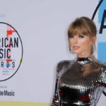 Wedding Lockdown Guts Bar Sales A celebrity posing on the red carpet at the American Music Awards