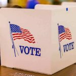 voting booth with American flag graphics