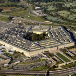 24-Hour Memo Shreds Worker Rights Aerial view of the Pentagon building surrounded by roads and greenery