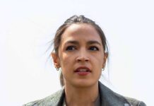 SHOCKING Move: AOC Trashes Filibuster, Hints Bigger woman speaking outdoors with neutral background