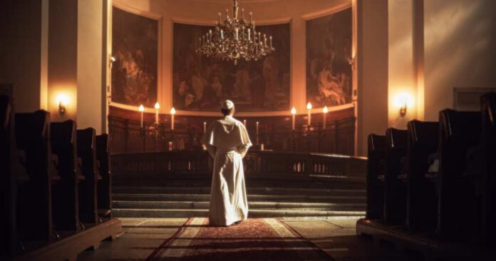 The,Pope,Stands,At,The,Altar,,A,Figure,Of,Reverence, A religious figure standing in a church with candlelight and historic artwork