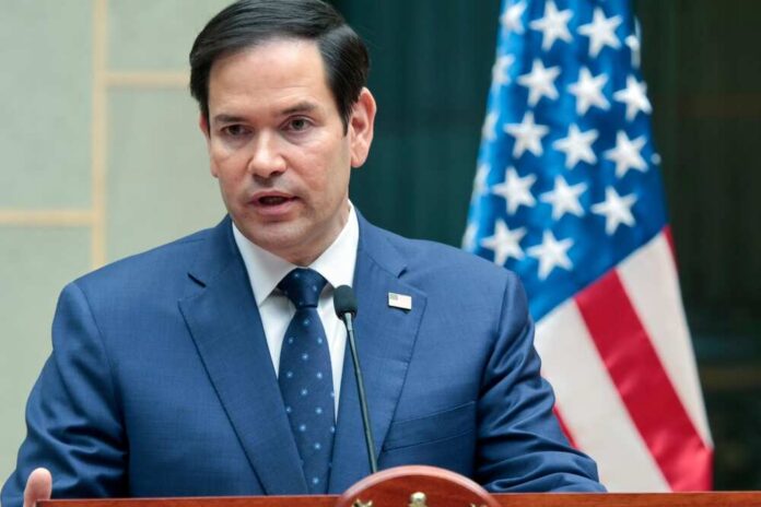 Guatemala,City,,Guatemala.,02-05-25.,Usa,Secretary,Of,State,Marco,Rubio Marco Rubio speaking at a podium with an American flag in the background