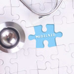 Inflated Victory? Washington’s $42B Medicare Mirage A stethoscope next to a puzzle piece labeled 'Medicaid'