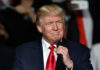 Primetime Showdown: Trump Torches ‘Clean’ Election Line Donald Trump speaking at a rally with a microphone