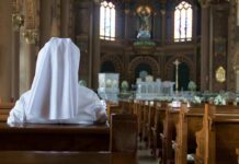 Church Pushes Shocking Burial Overhaul Person in white habit seated in a church pew facing the altar