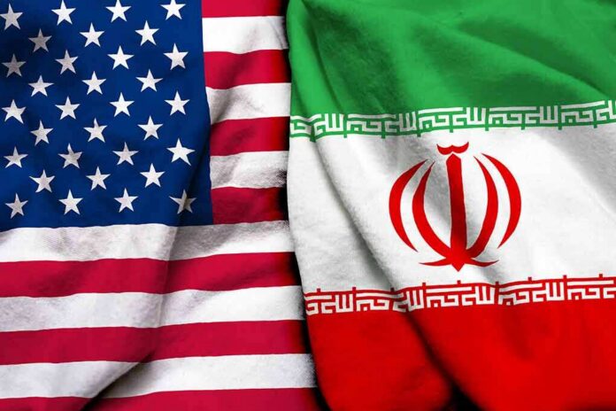 shutterstock_1041239128 United States and Iran flags side by side
